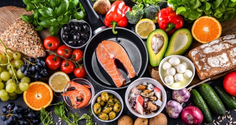 Adherence to dietary patterns such as the Mediterranean diet – rich in vegetables, whole grains and fruit, and lower in red meat and processed fats – may confer protective effects against AMD. Image: monticello/Shutterstock.com.